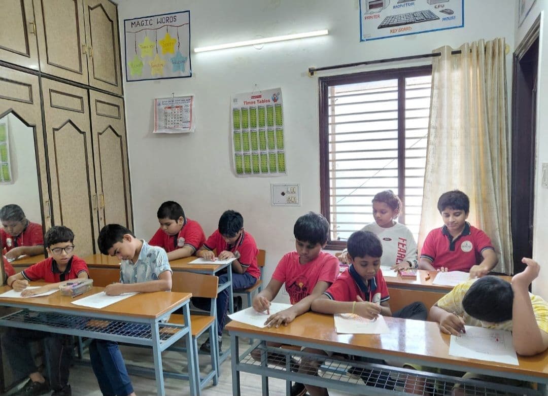Focused classwork at the Academy
