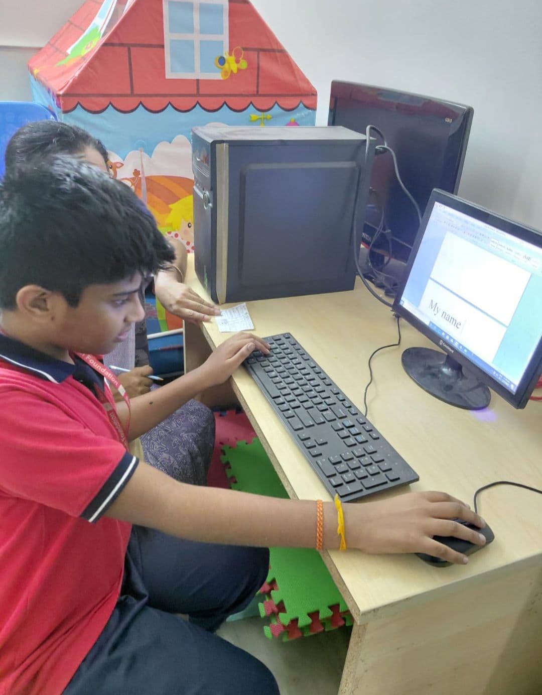 Learning computer skills at the Academy