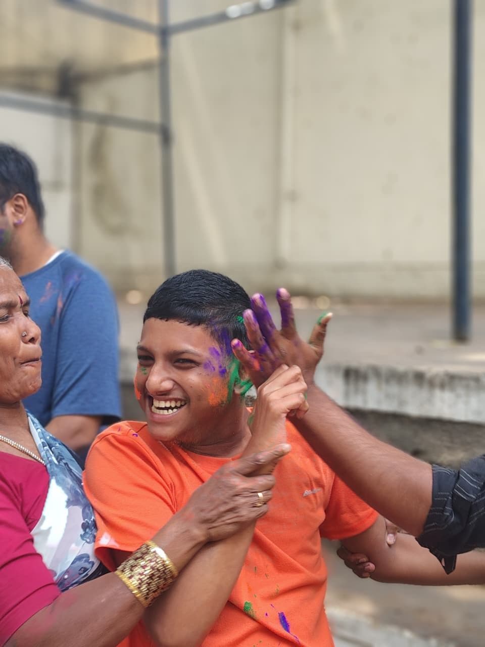 Joyful moment with paint on hands during art time