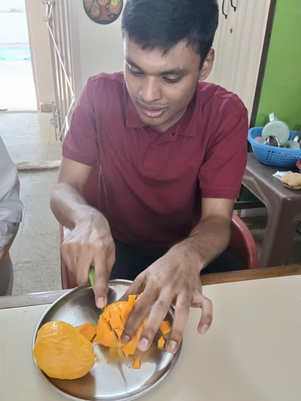 Preparing fruit during a cooking activity