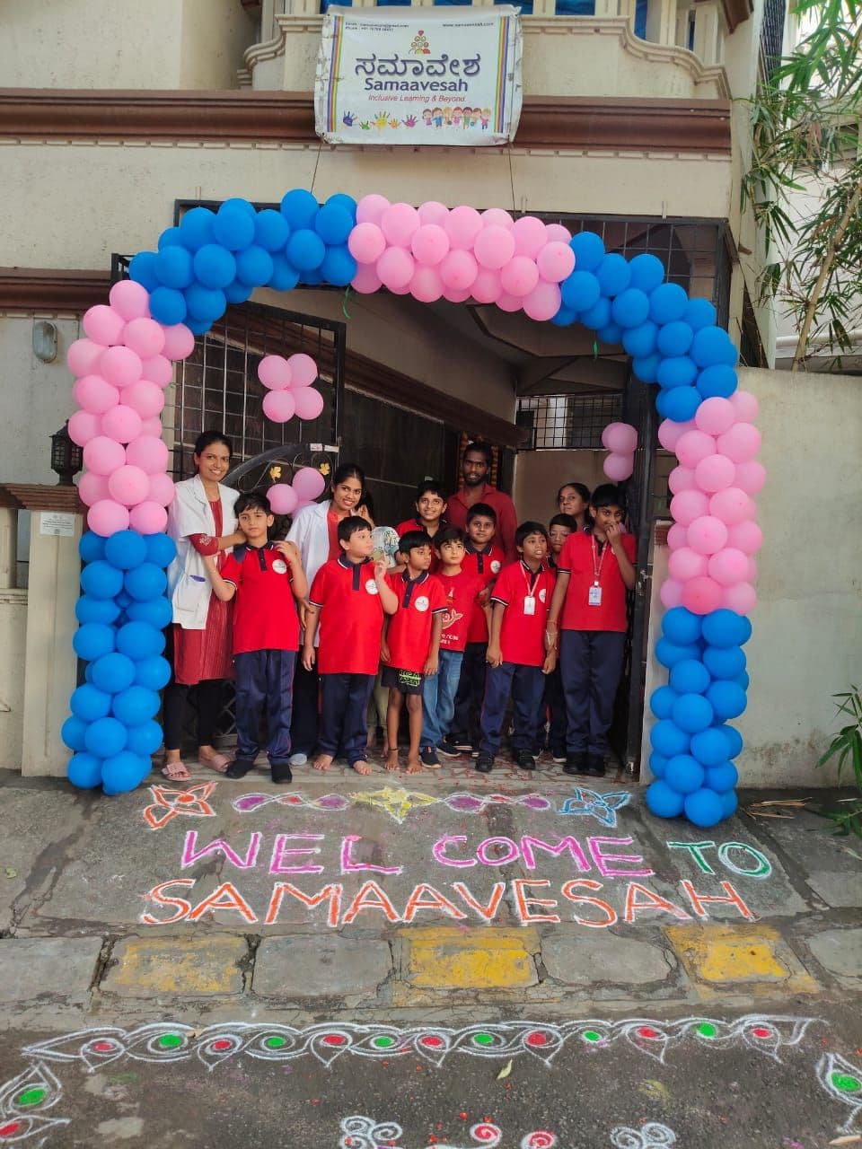 Children gathered at the decorated gate